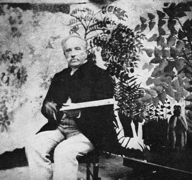 famous-recognised-self-taught-fine-artist-painting-in-his-studio